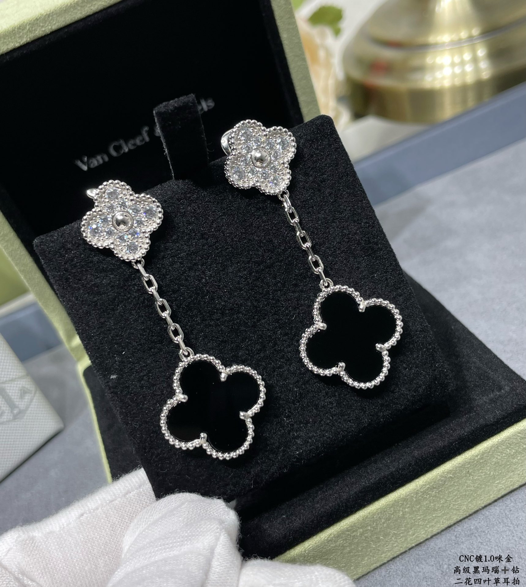 v*n cl*f & arpels high-grade black agate with Di*m*nd two-flower four-leaf clover earrings