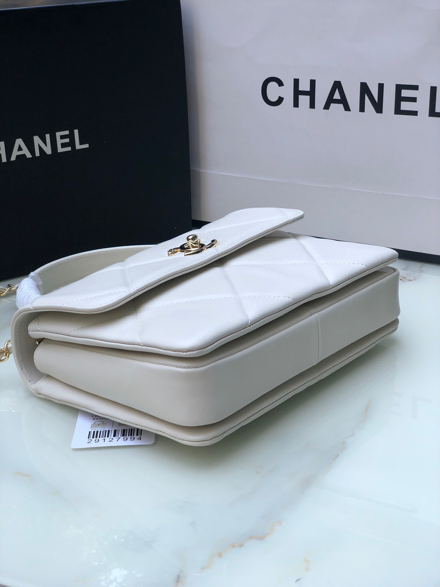 Ch*el flap bag with top handle 6.6 × 9.8 × 4.7 in