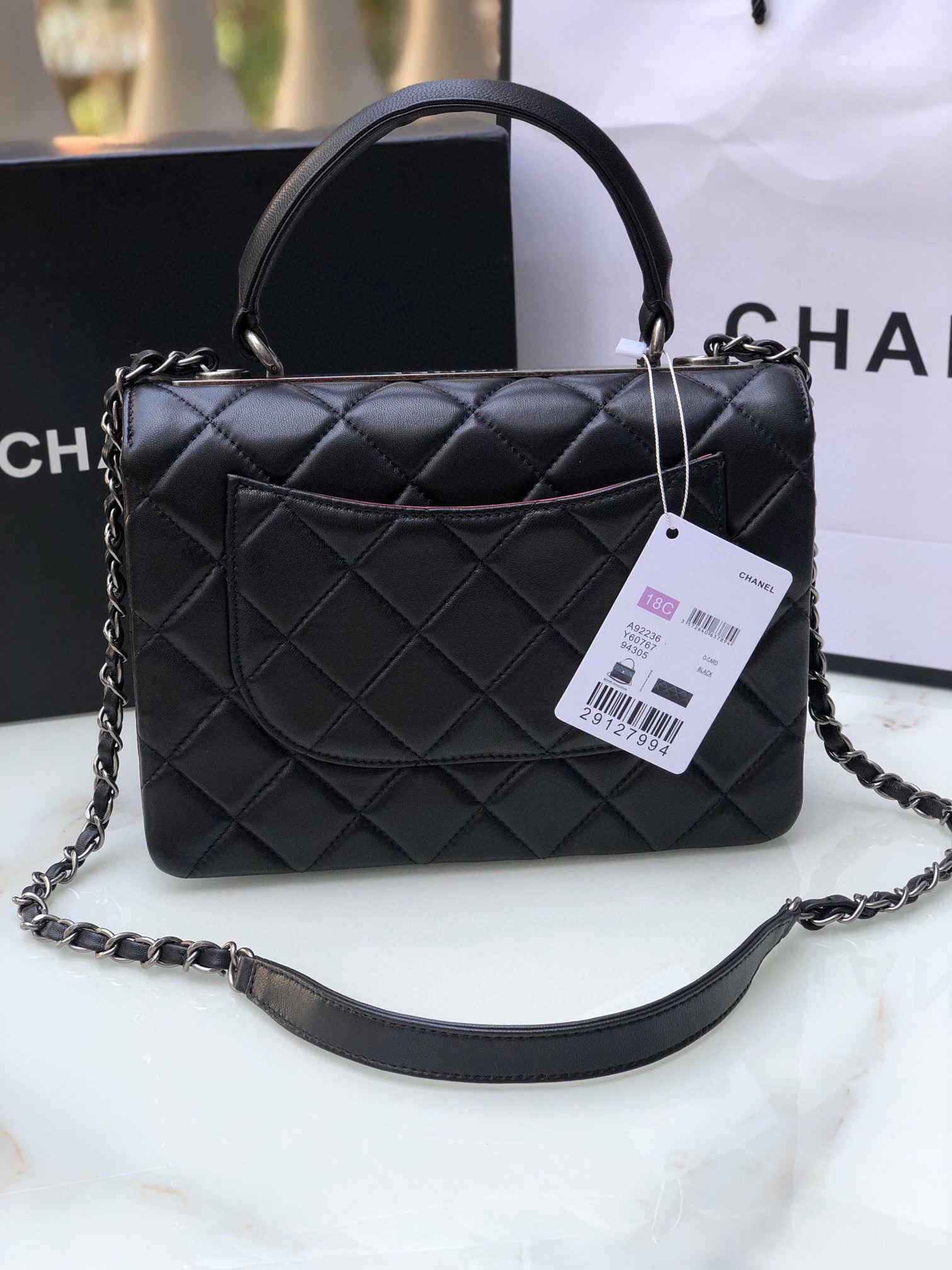 Ch*el flap bag with top handle 6.6 × 9.8 × 4.7 in