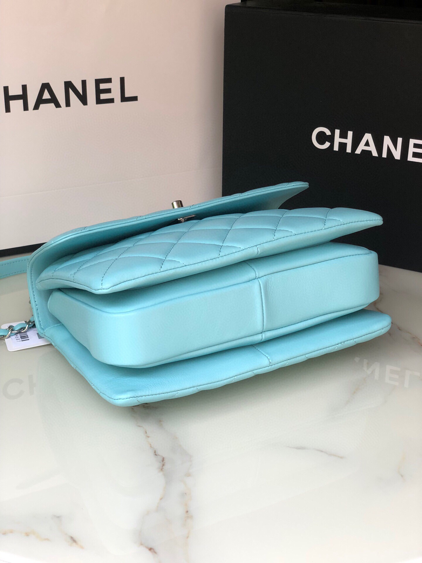 Ch*el flap bag with top handle 6.6 × 9.8 × 4.7 in