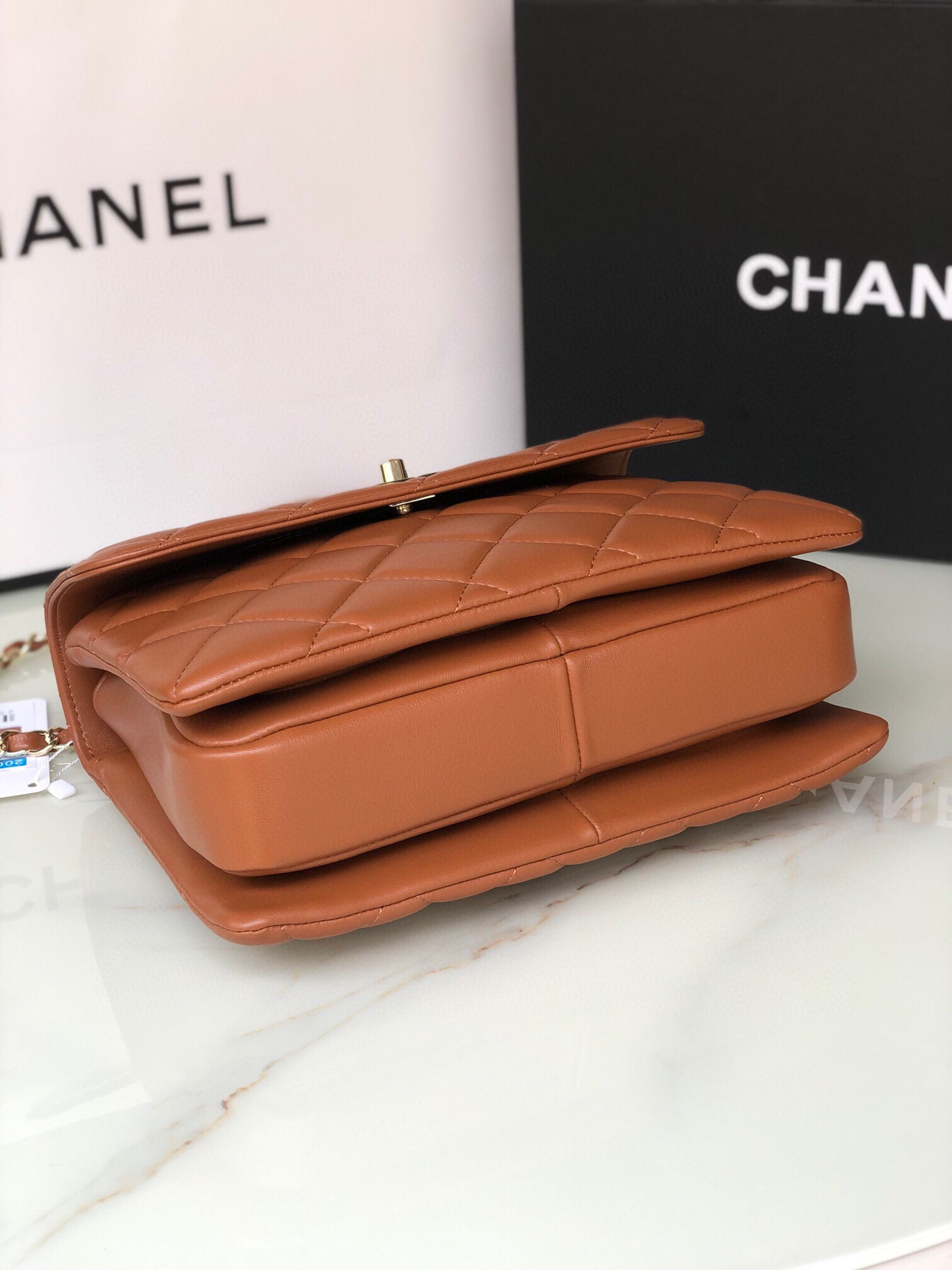 Ch*el flap bag with top handle 6.6 × 9.8 × 4.7 in