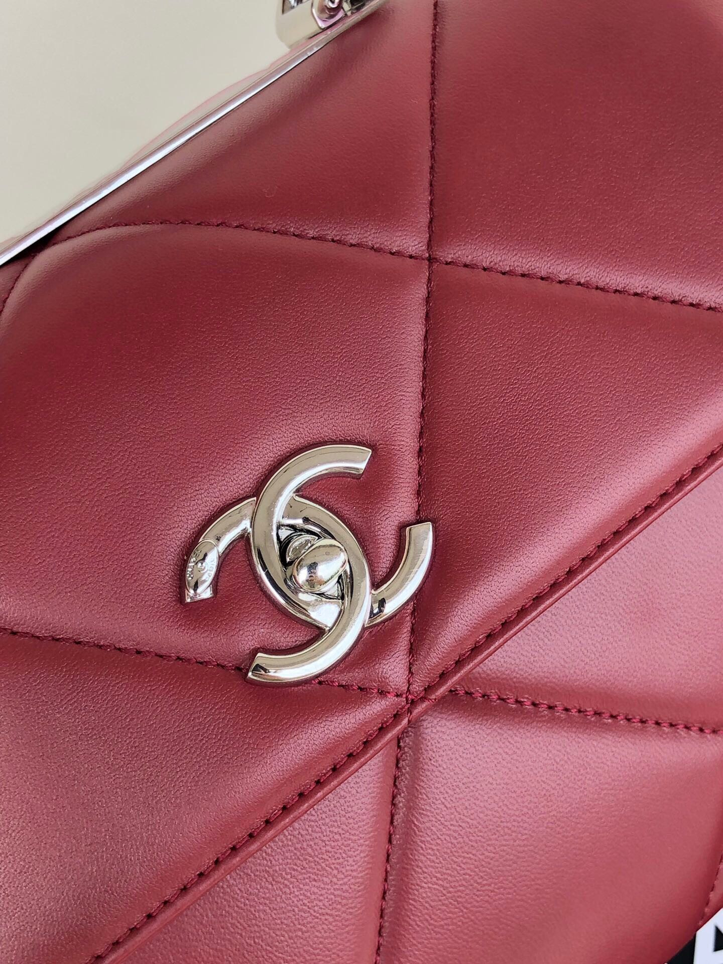 Ch*el flap bag with top handle 6.6 × 9.8 × 4.7 in