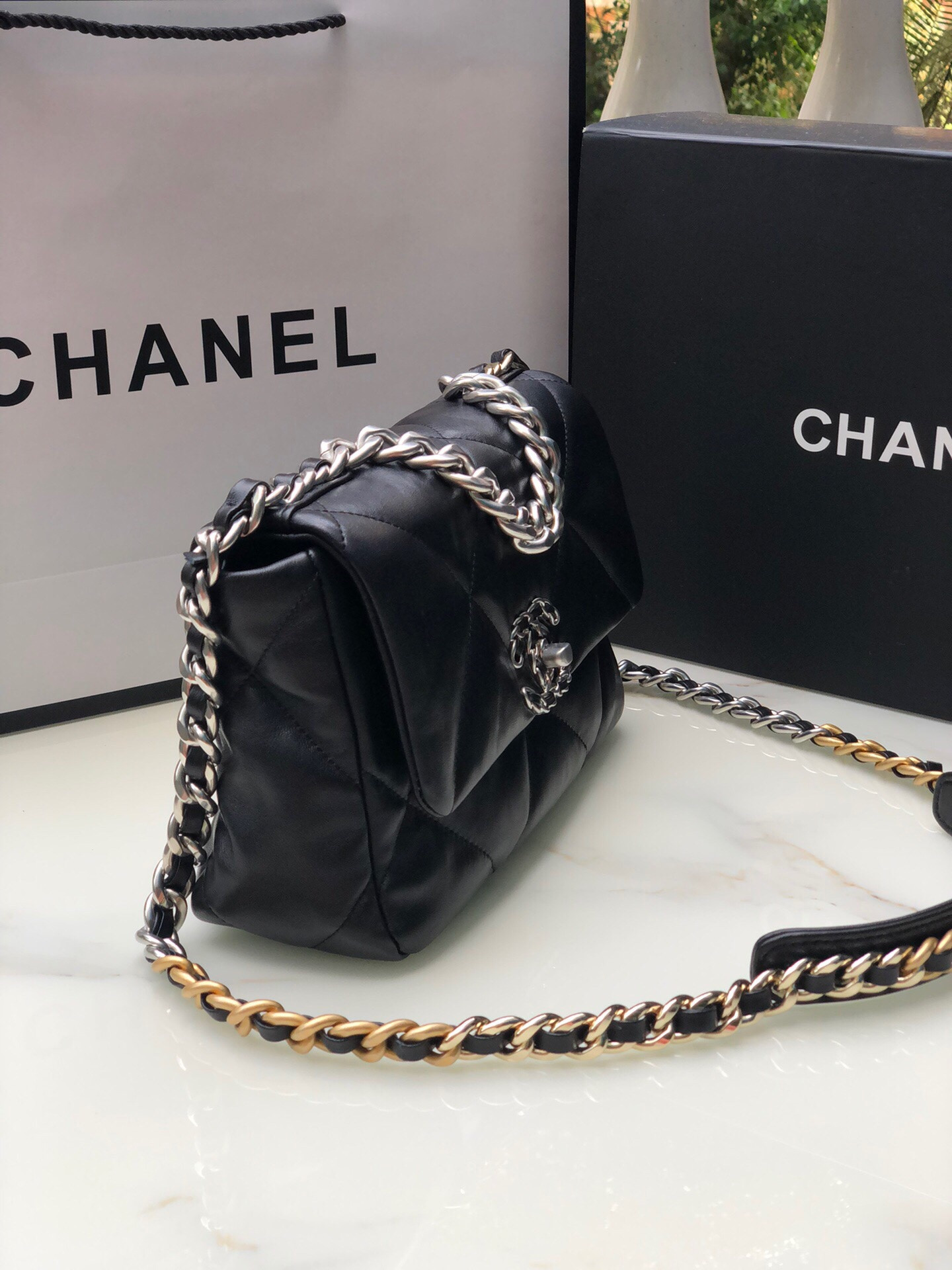 Ch**el 19 HANDBAG Shiny Leather, Gold-Tone, Silver-Tone & Ruthenium-Finish Metal Black 6.2 × 10.1 × 3.5 in