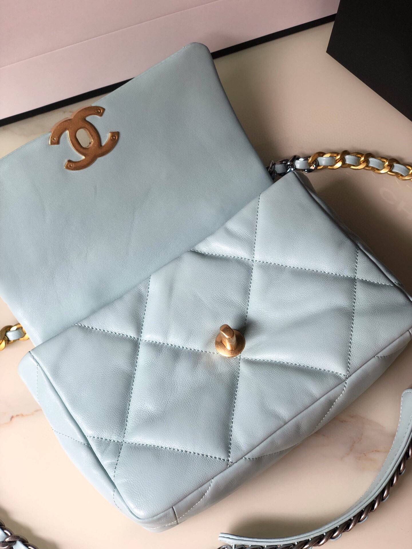 Ch**el 19 HANDBAG Shiny Leather, Gold-Tone, Silver-Tone & Ruthenium-Finish Metal Light Blue 6.2 × 10.1 × 3.5 in