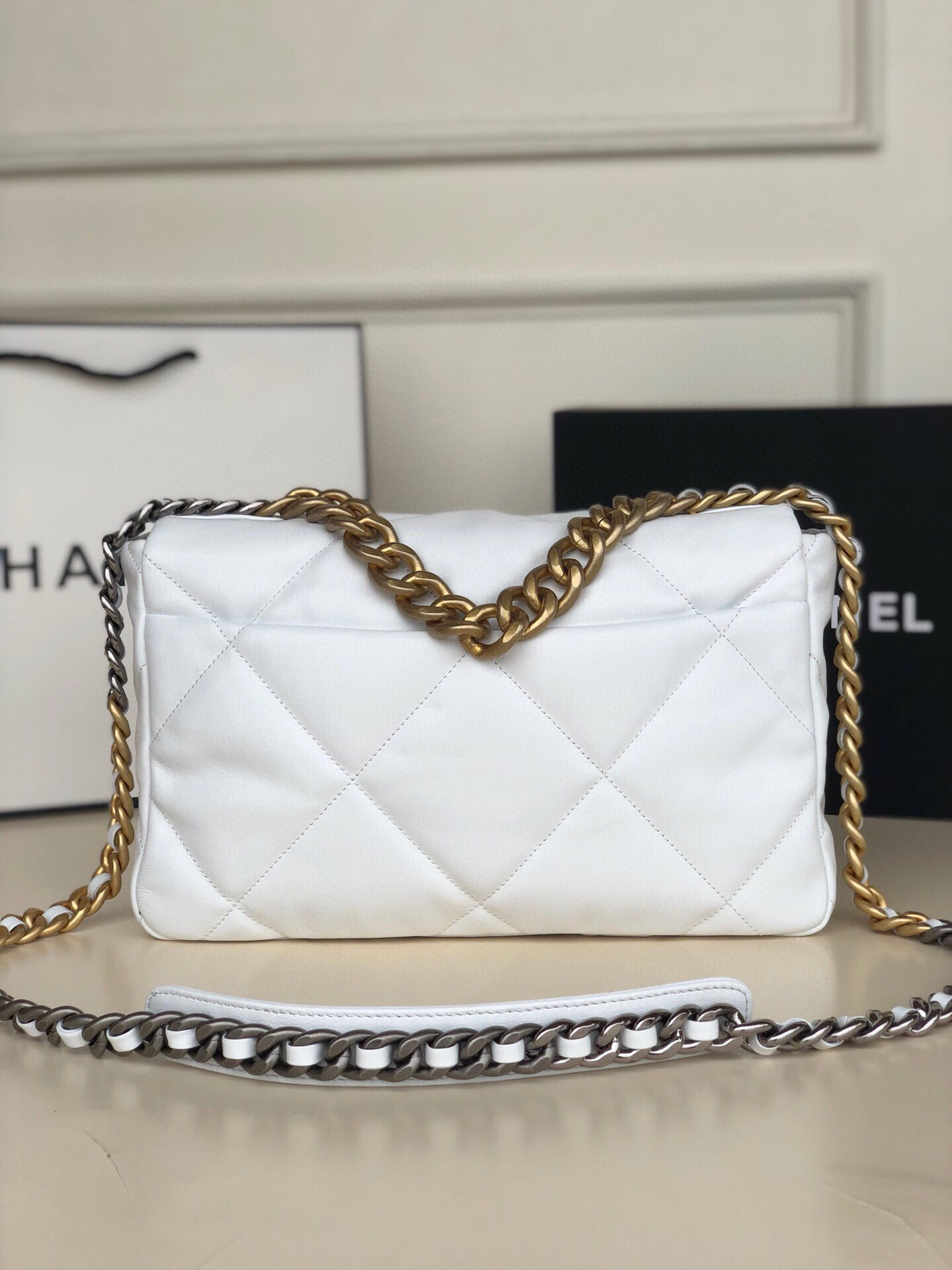 Ch**el 19 LARGE HANDBAG Shiny Leather, Gold-Tone, Silver-Tone & Ruthenium-Finish Metal White 7.8 × 11.7 × 3.9 in